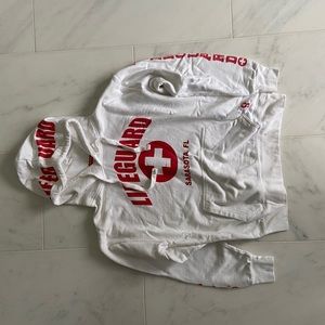 white and red lifeguard hoodie